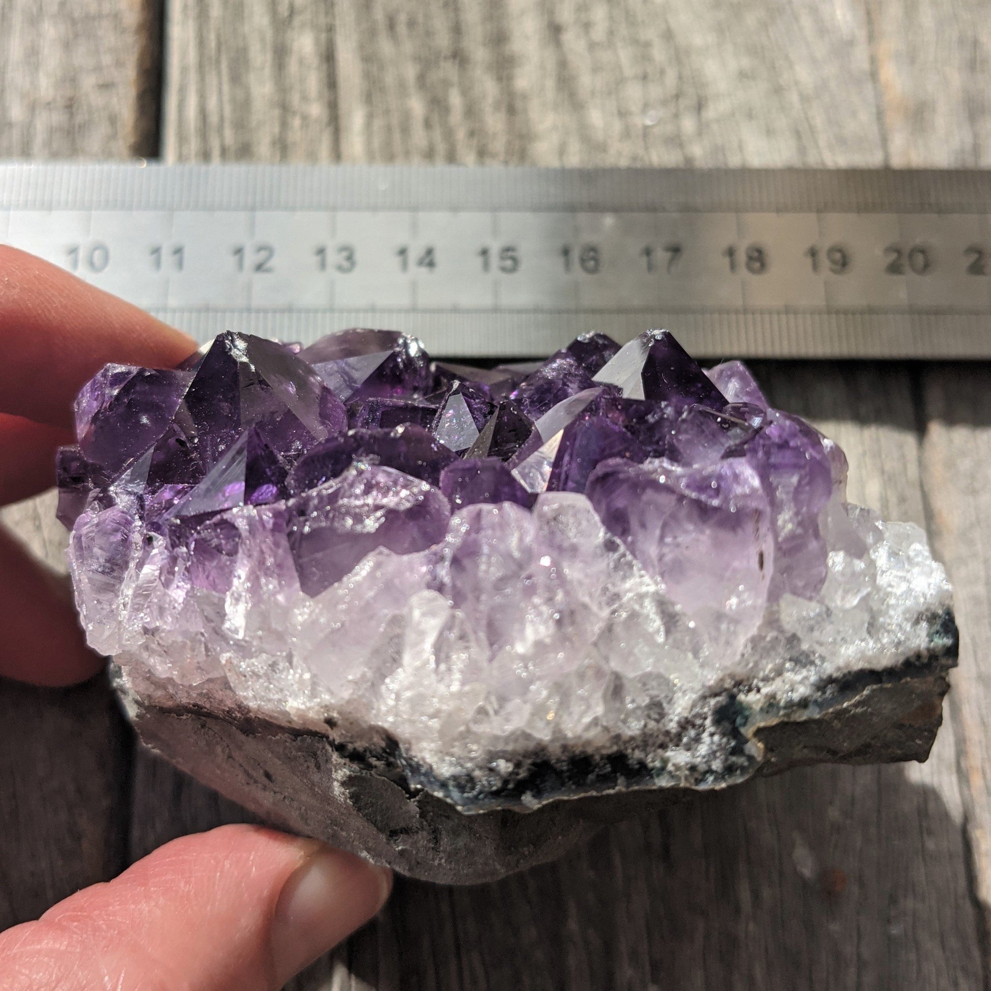Amethyst crystal cluster side view