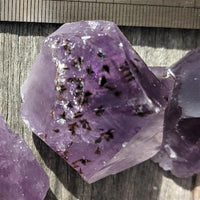amethyst points cut base inclusions