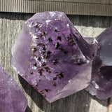 amethyst points cut base inclusions